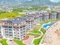 Продажа двухкомнатных апартаментов, 55 м², этаж 2 из 5. Фото 1